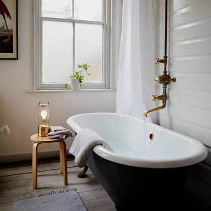 The Muse 2.0 Portable Lamp in Solid Brass